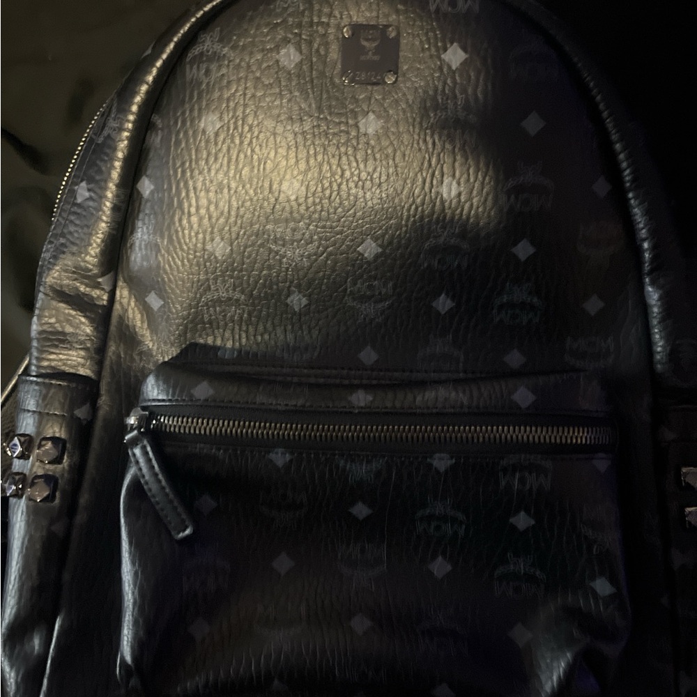 MCM Black Backpack with Studded Design and Durable Material